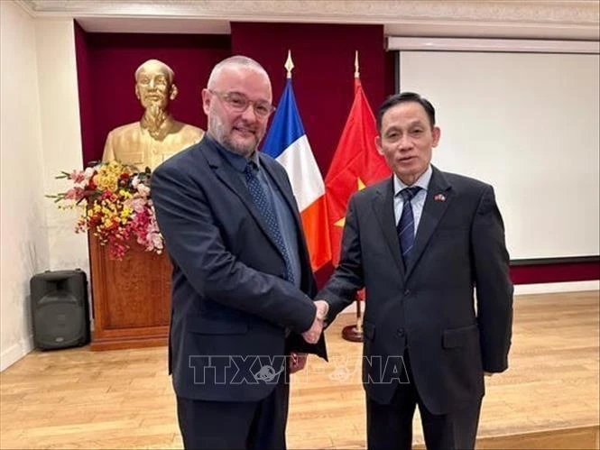 Party official works with National Secretary of French Socialist Party for International Relations