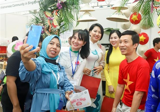 Le Vietnam participe à la célébration de la Journée internationale des migrants à Singapour