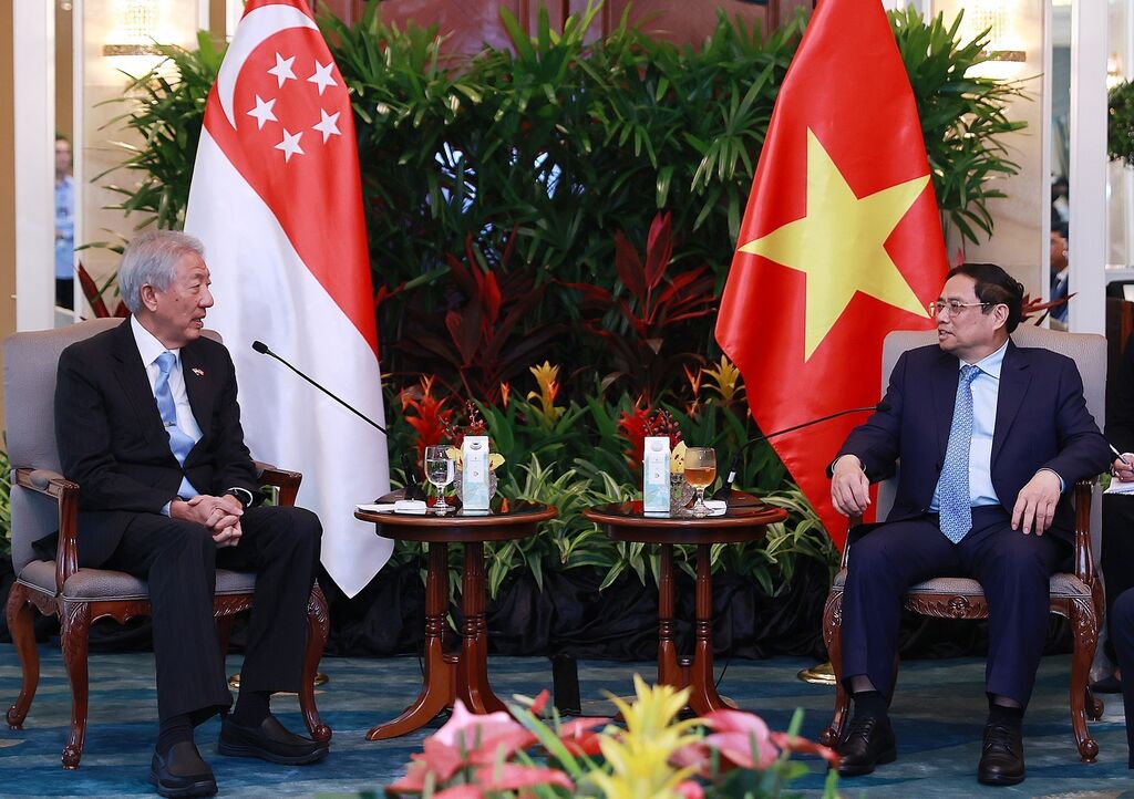 Le Premier ministre Pham Minh Chinh reçoit le ministre sénior Teo Chee Hean