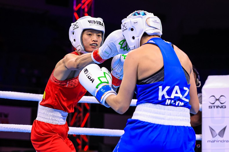 Boxe féminine Nguyen Thi Tam bat la double championne du monde Nawym Kyzaibay