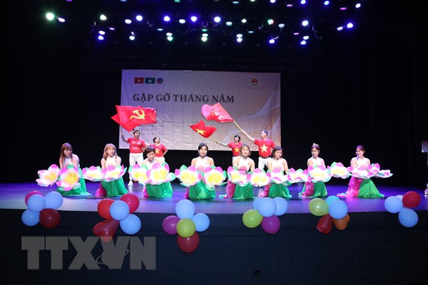 Les Vietnamiens de Macao Chine orientent vers le pays natal