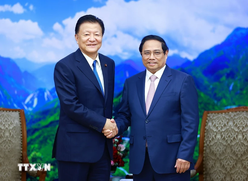 Le Premier ministre Pham Minh Chinh reçoit le ministre japonais chargé du CPTPP