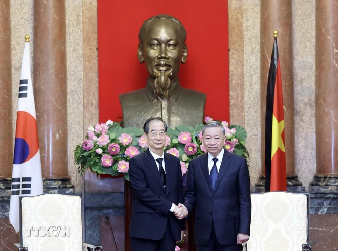 Le président vietnamien To Lam reçoit le Premier ministre Han Duck Soo