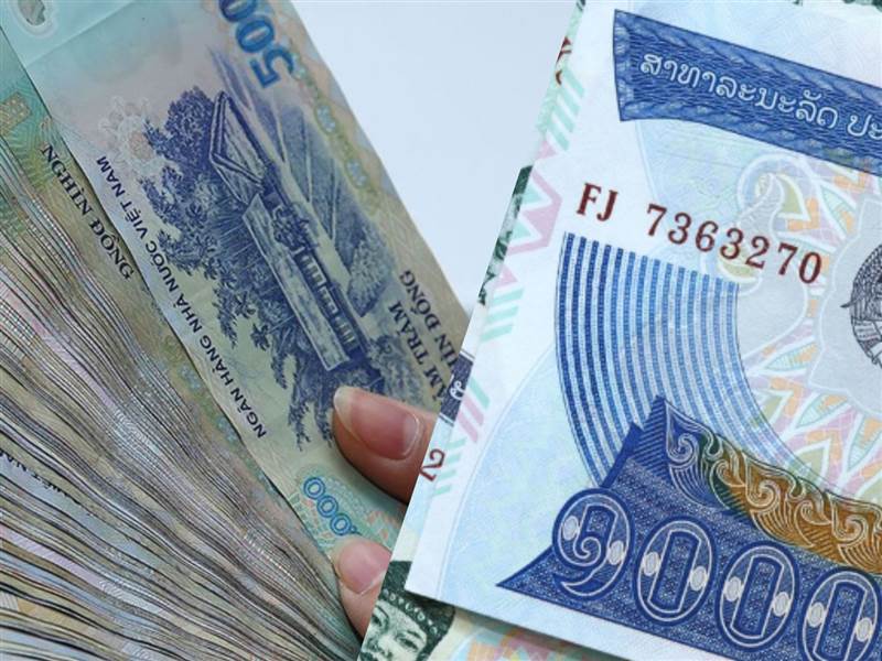 Coopération Vietnam-Laos dans l utilisation des monnaies locales dans le commerce bilatéral