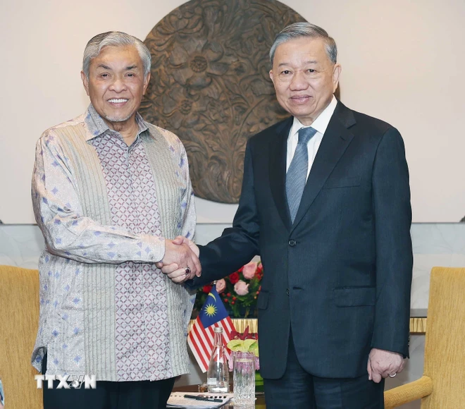 Le leader du PCV Tô Lâm rencontre le vice-Premier ministre malaisien Ahmad Zahid Hamidi