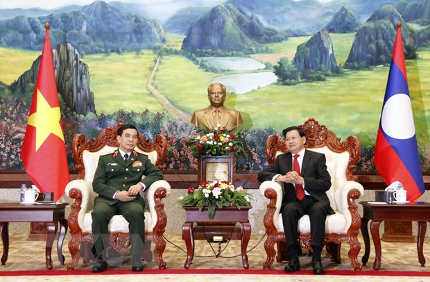 老挝党和国家领导人会见越南国防部长潘文江