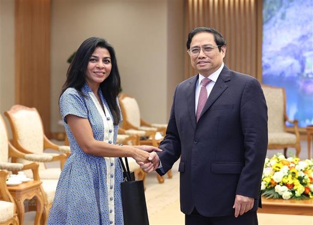 政府总理范明正会见国际货币基金组织代表团