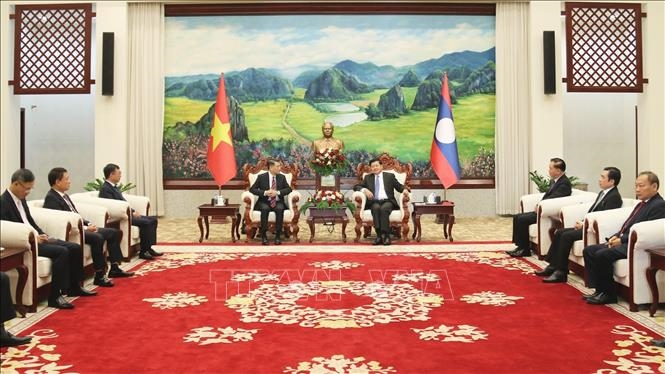 越共中央办公厅主任黎明兴对老挝进行工作访问