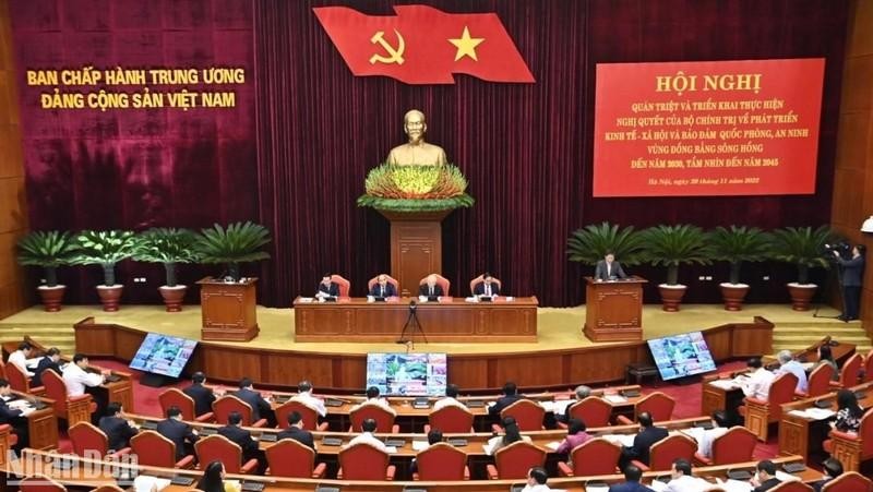 阮富仲总书记主持贯彻落实红河平原地区发展决议的会议