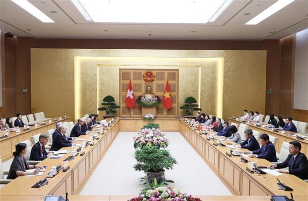 范明正会见瑞士联邦议会国民院议长