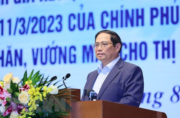 越南政府总理范明正主持化解房地产市场困难和应对挑战的会议