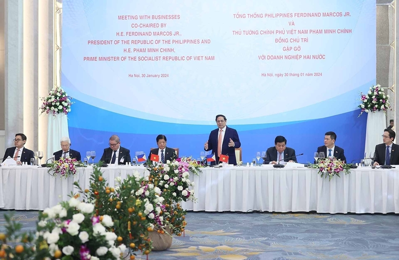 范明正总理与菲律宾总统共同主持越菲模范企业见面会