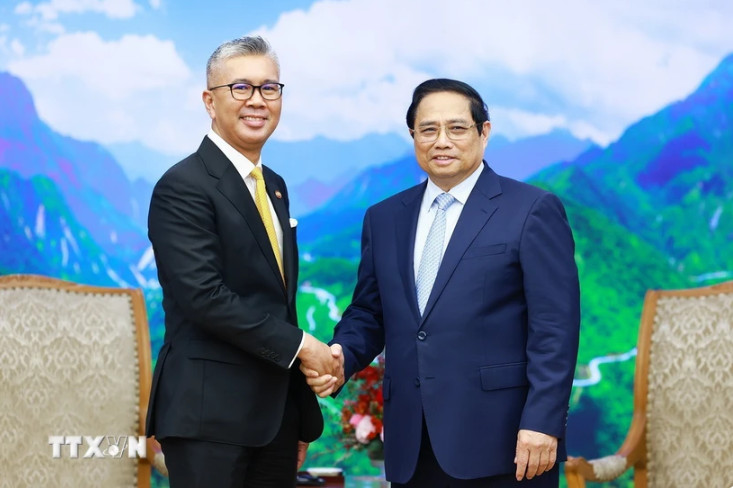 越南政府总理范明正会见马来西亚投资贸易与工业部部长