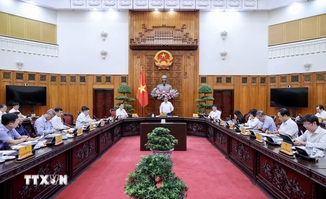 越南政府总理范明正主持召开金融领域立法工作会议