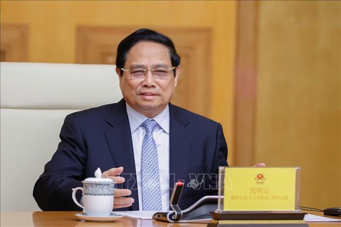 范明正总理建议求全球最大商业集团考虑并参与越南基础设施项目