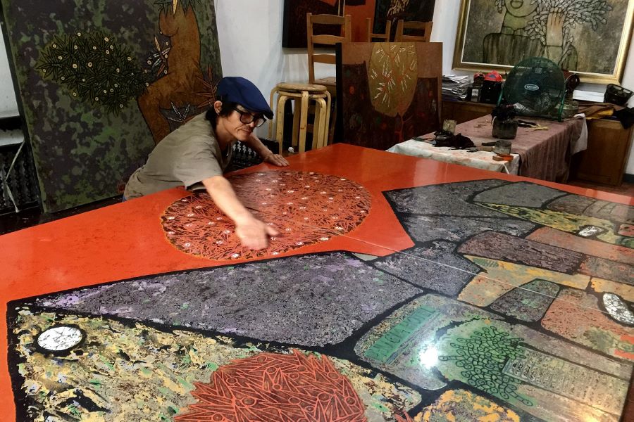 Новый облик вьетнамских народных картин, выполненных в стиле гравюры в сочетании с традиционным живописным лаком