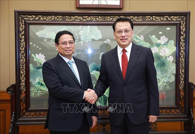 Премьер-министр Фам Минь Тьинь встретился с Секретарем Парткома г Чунцин