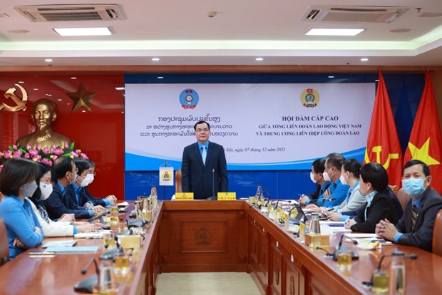Vietnam y Laos forjan cooperación sindical