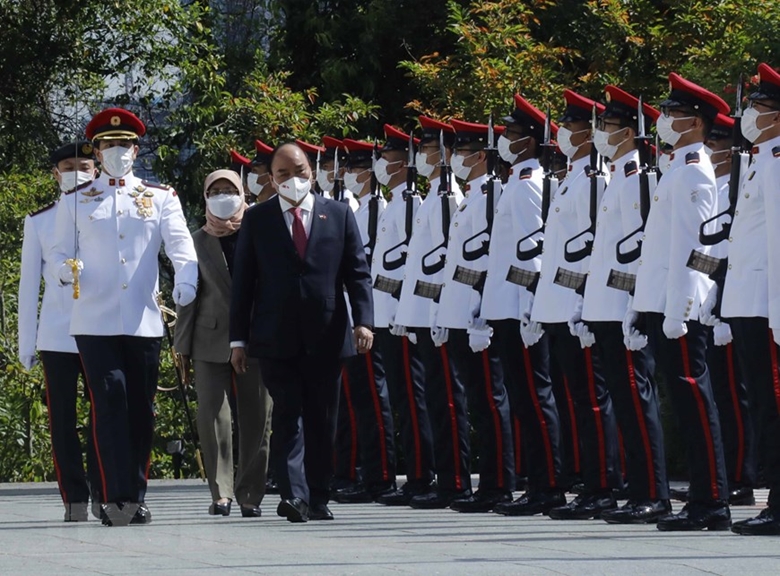 La ceremonia de bienvenida al presidente vietnamita en Singapur