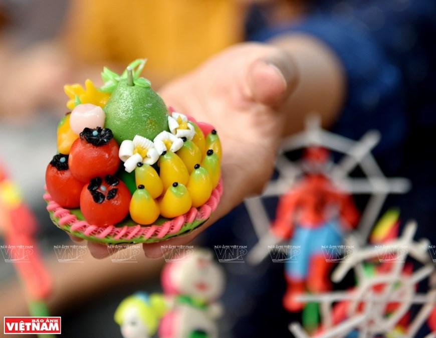 Arte singular de elaborar juguetes de harina de arroz To He