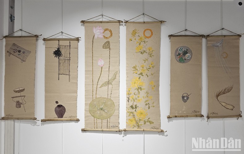 Pintura vietnamita sobre materiales tradicionales atrae al público francés